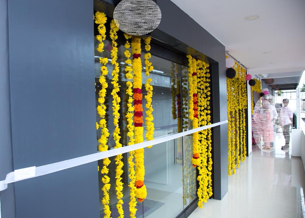 Reception area at He n’ She with seating for customers